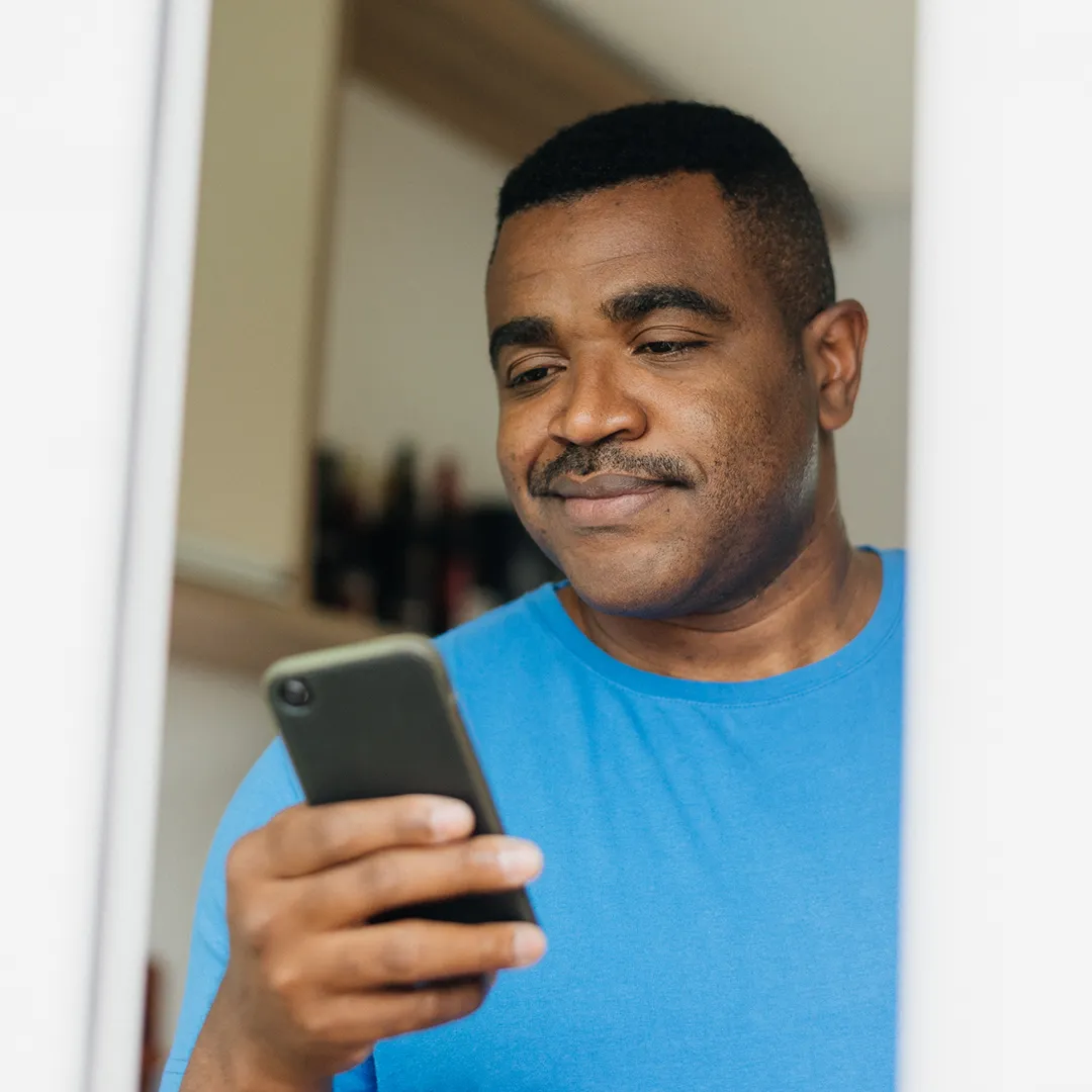 man shopping for a Florida Blue health plan on his phone