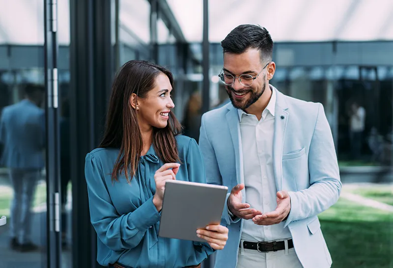 two business people discussing employee benefits