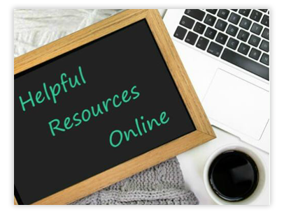 Chalkboard that says helpful resources online with laptop and cup of coffee.