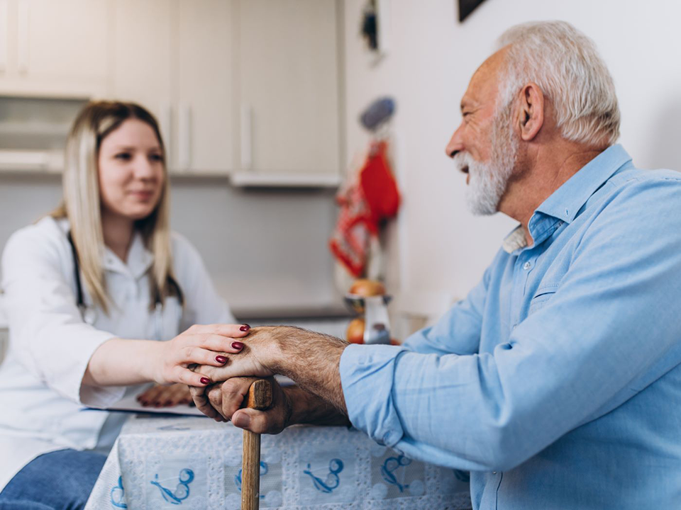A man gets help from his health care provider.