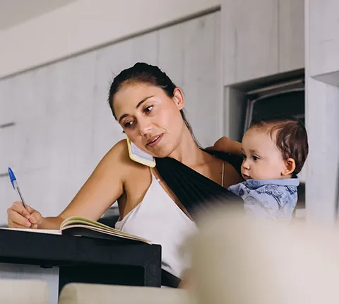 man talking to a Florida Blue agent on the phone