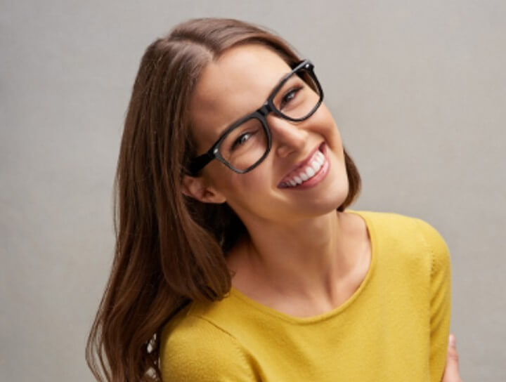 smiling woman with glasses