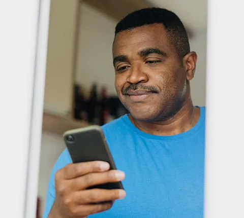 man looking at his phone