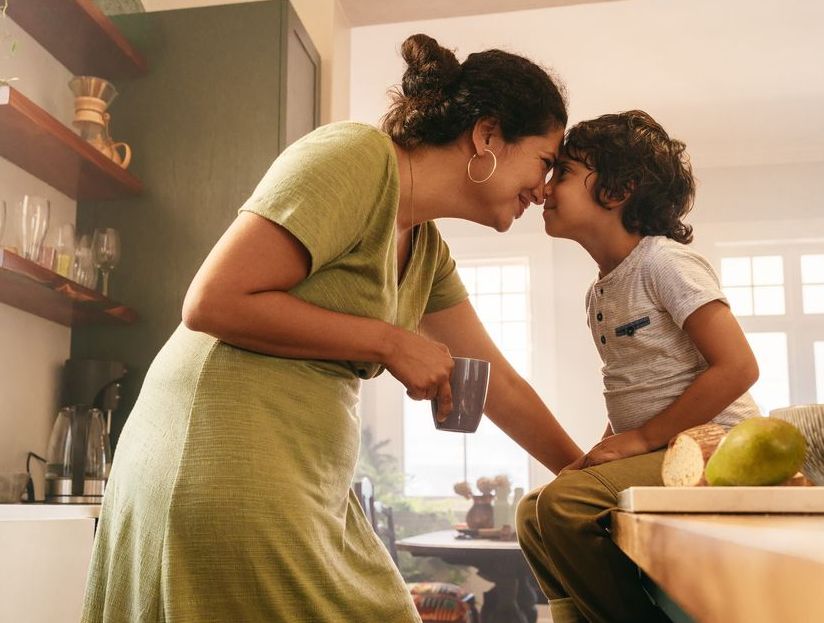 mother and son in kitchen together